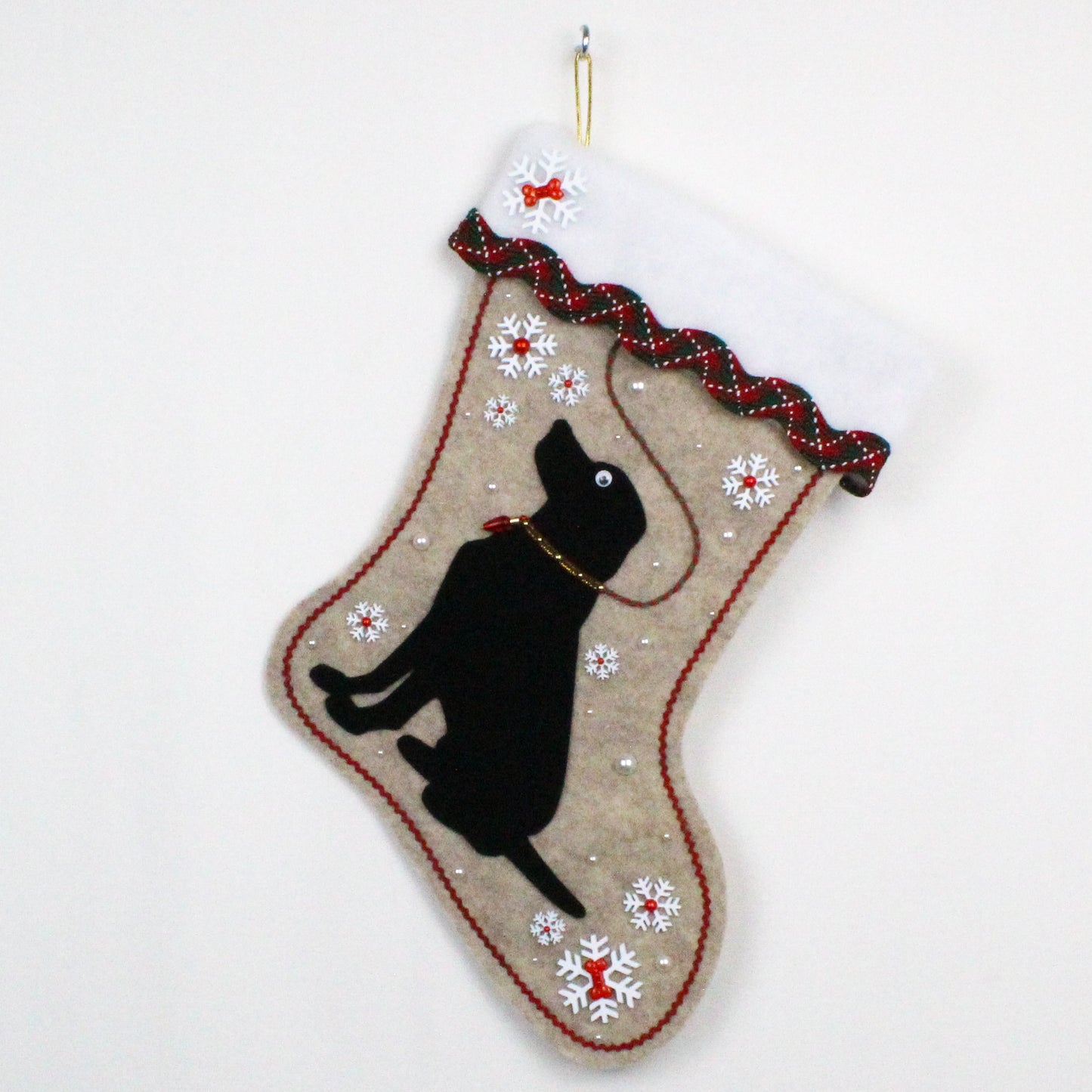 Black Labrador Retriever dog on beige felt Christmas stocking