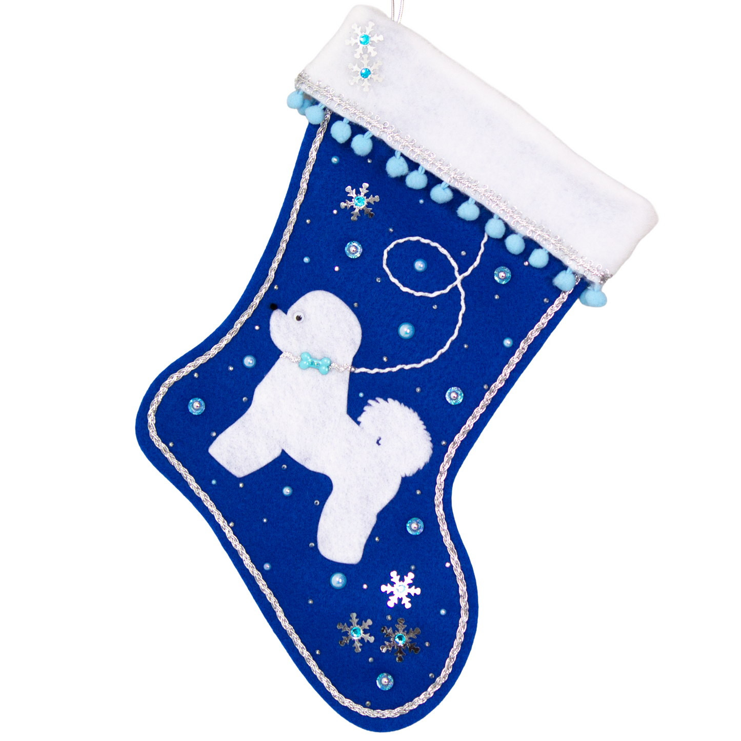 Bichon Frise dog in white felt Christmas stocking on royal blue felt with sequin stars, pom poms and decorations in light blue, white and silver. (Front of stocking)