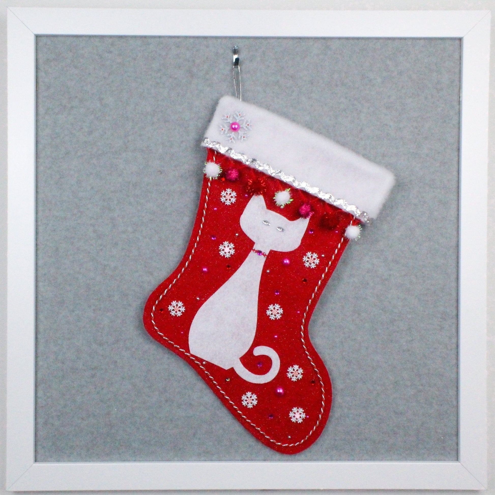 Glitter white cat on a red glitter felt handmade OOAK Christmas stocking with snowflakes,  sparkly pom poms and silver decoration.