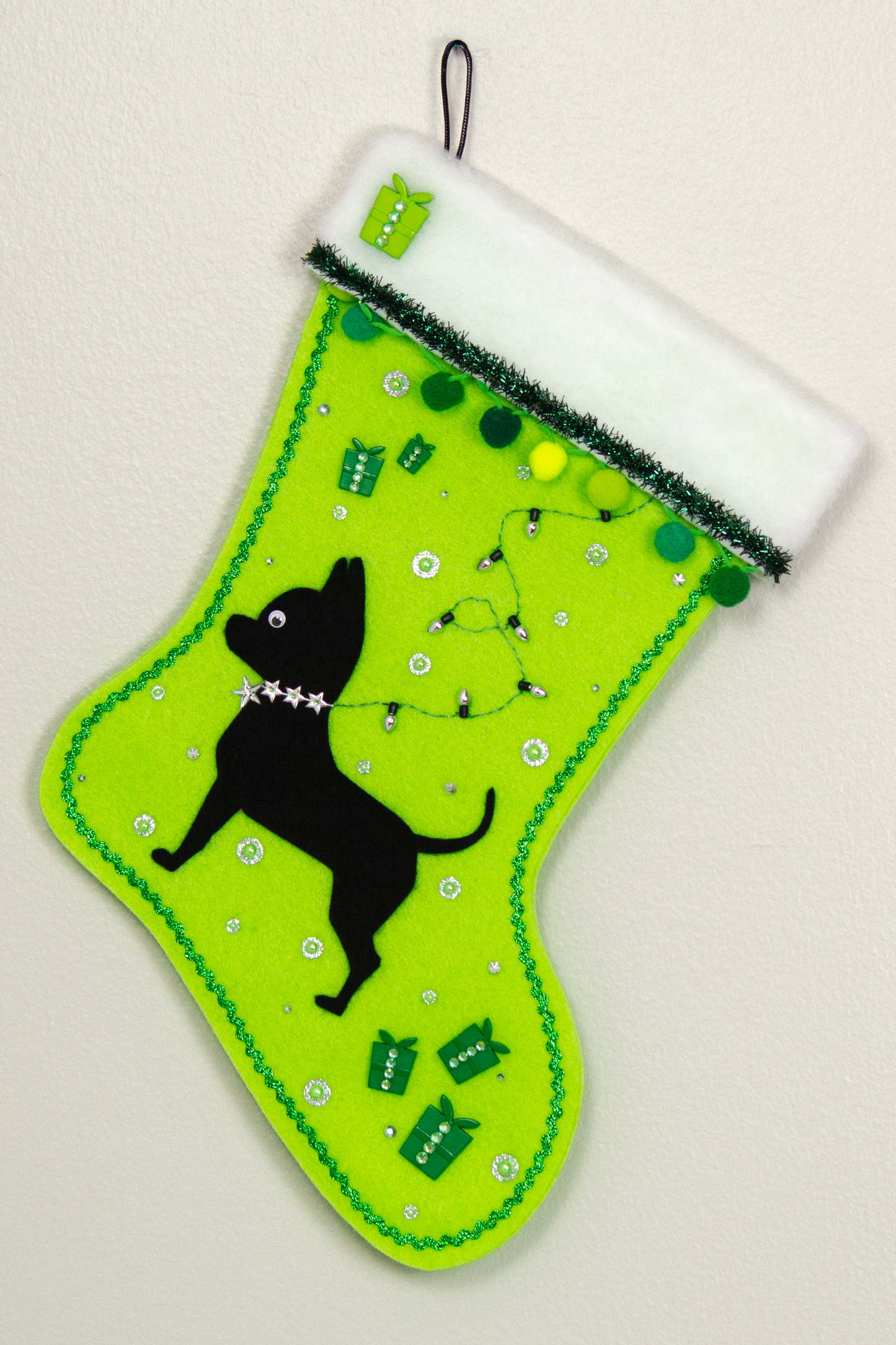Black Chihuahua dog on green felt Christmas stocking