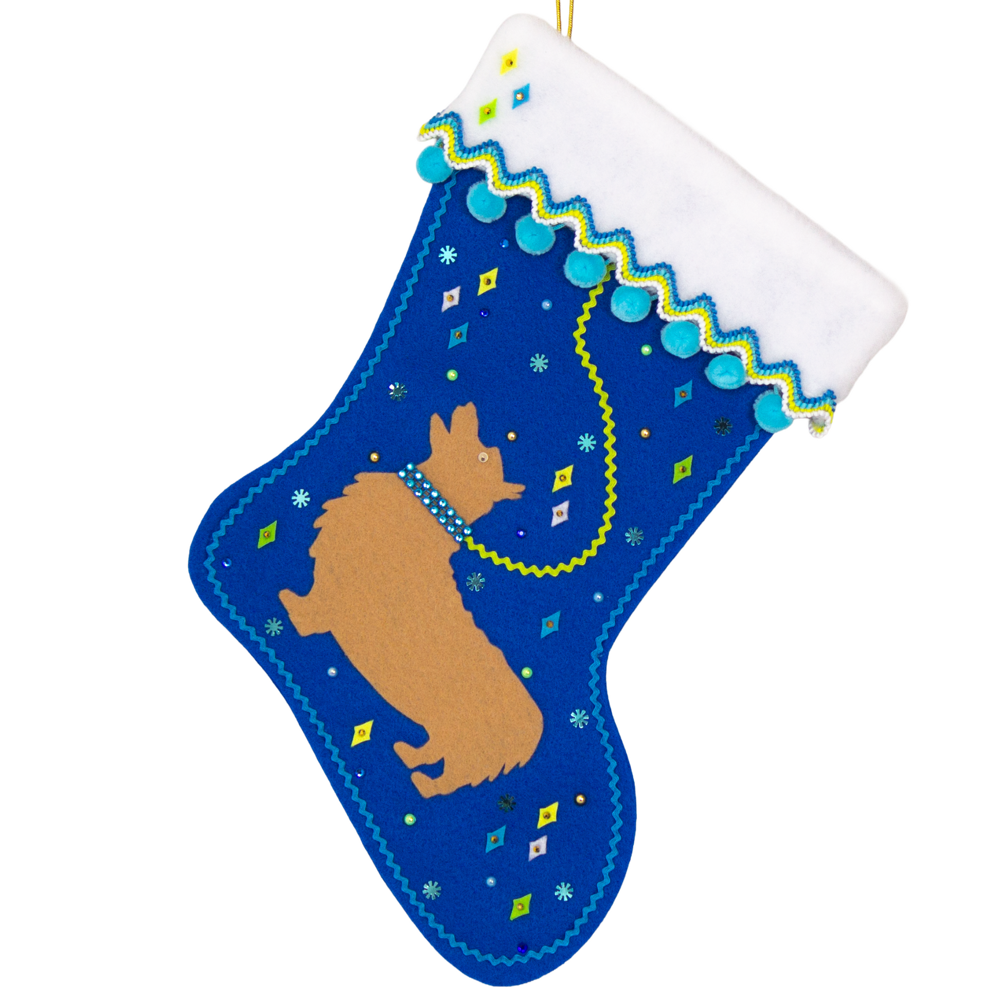 Tan Corgi dog on a royal blue felt Christmas stocking with pom poms, diamonds, snowflakes and decorated in yellow, green, blues and gold. (front of stocking)