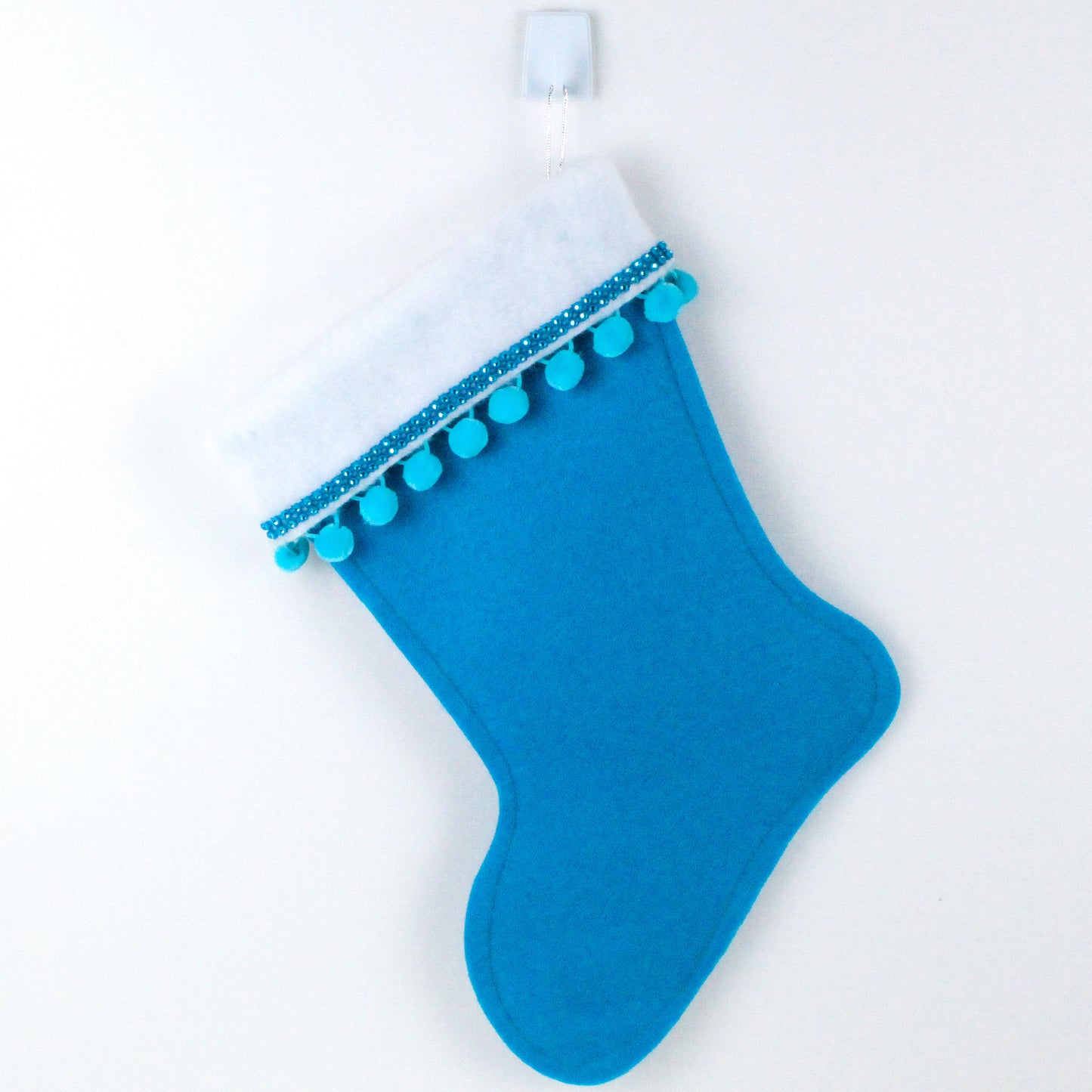 Brown Danish reindeer on blue felt Christmas stocking