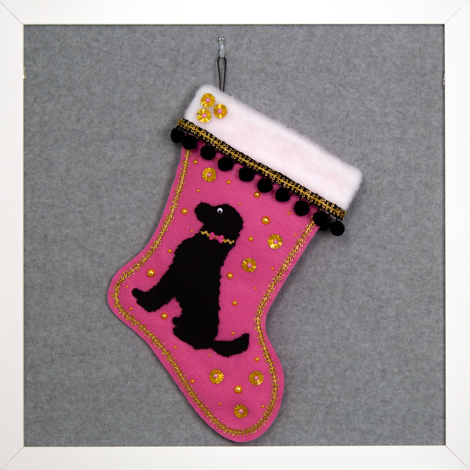 Black labradoodle on a candy pink felt handmade OOAK Christmas stocking with gold and black accents.