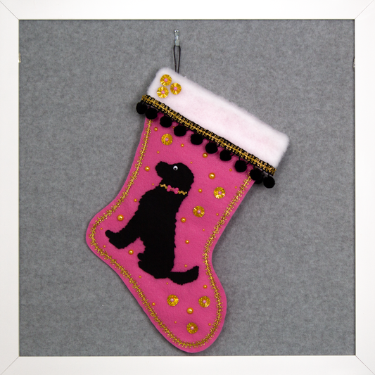 Black labradoodle on a candy pink felt handmade OOAK Christmas stocking with gold and black accents.