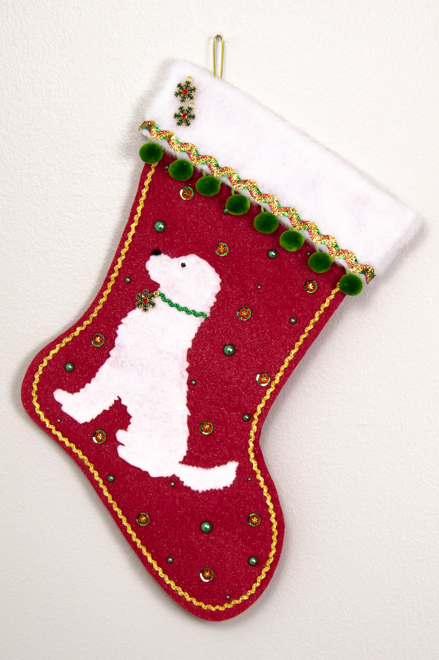 White Labradoodle dog on red felt Christmas stocking