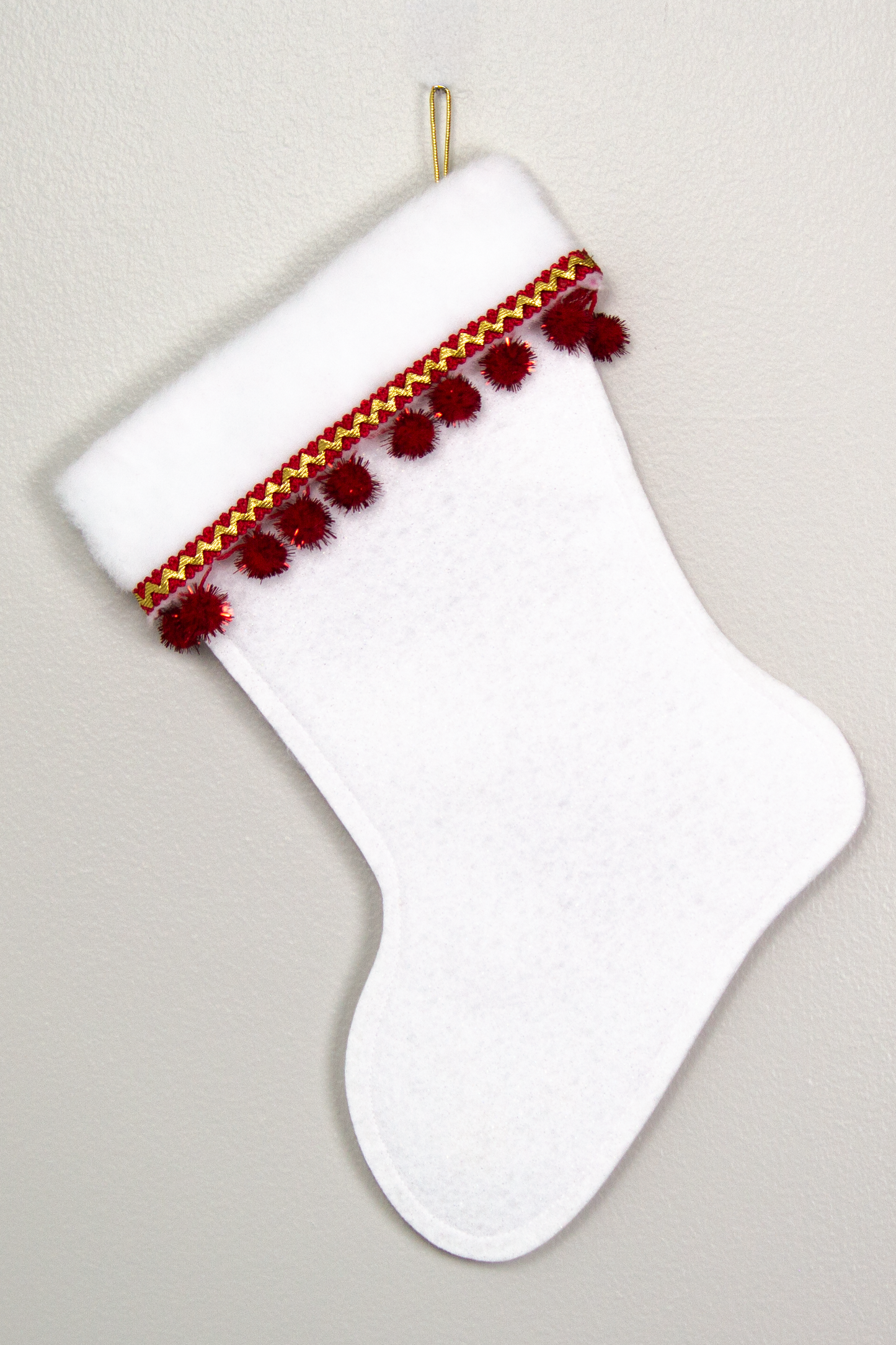 Brown Labradoodle dog on white felt Christmas stocking