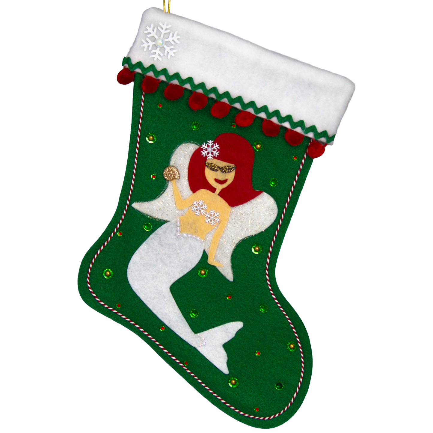 Ethel Mermaid with red hair, white glitter fin/tail, wings in white & gold mesh,  holding a sparkly seashell button, and a "bra" made of snowflake buttons on a holiday green felt handmade Christmas stocking decorated in white, red, green & gold. (front of stocking)