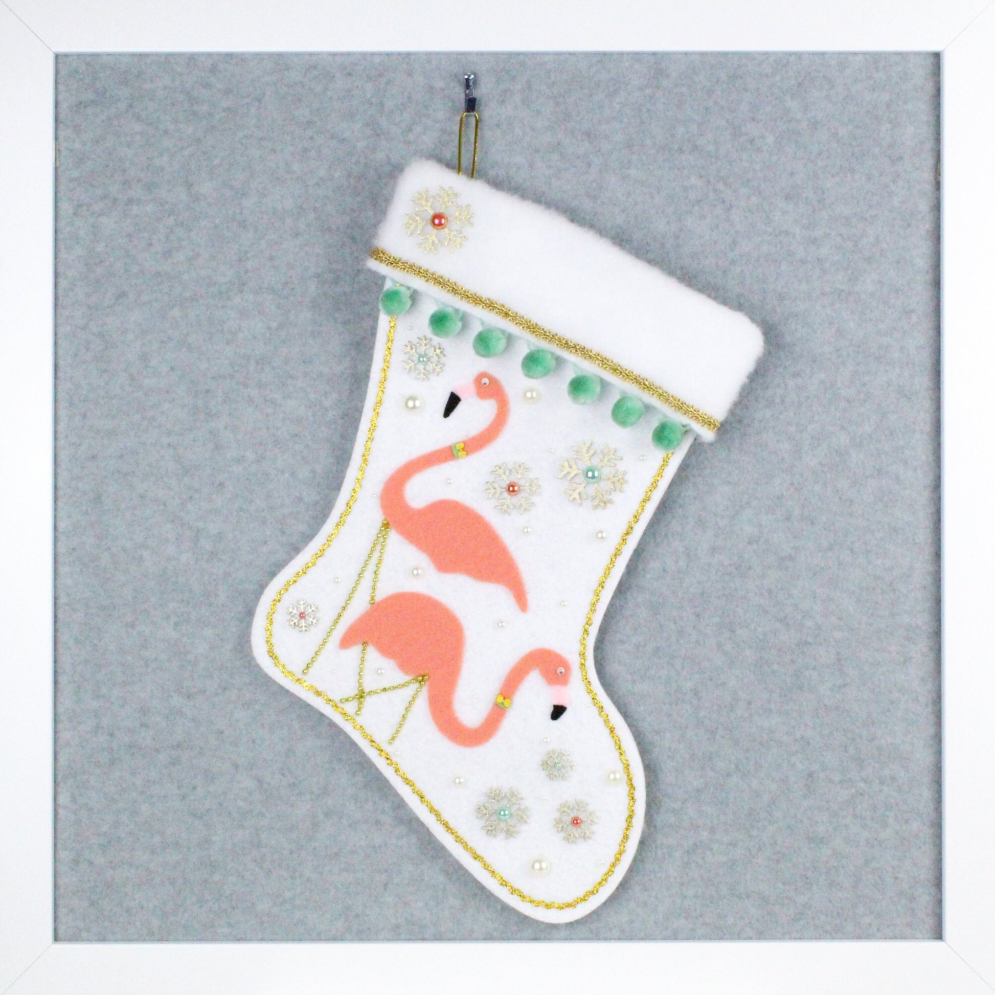 Coral flamingos on white glitter felt handmade OOAK Christmas stocking with mint green pom poms and gold accents.
