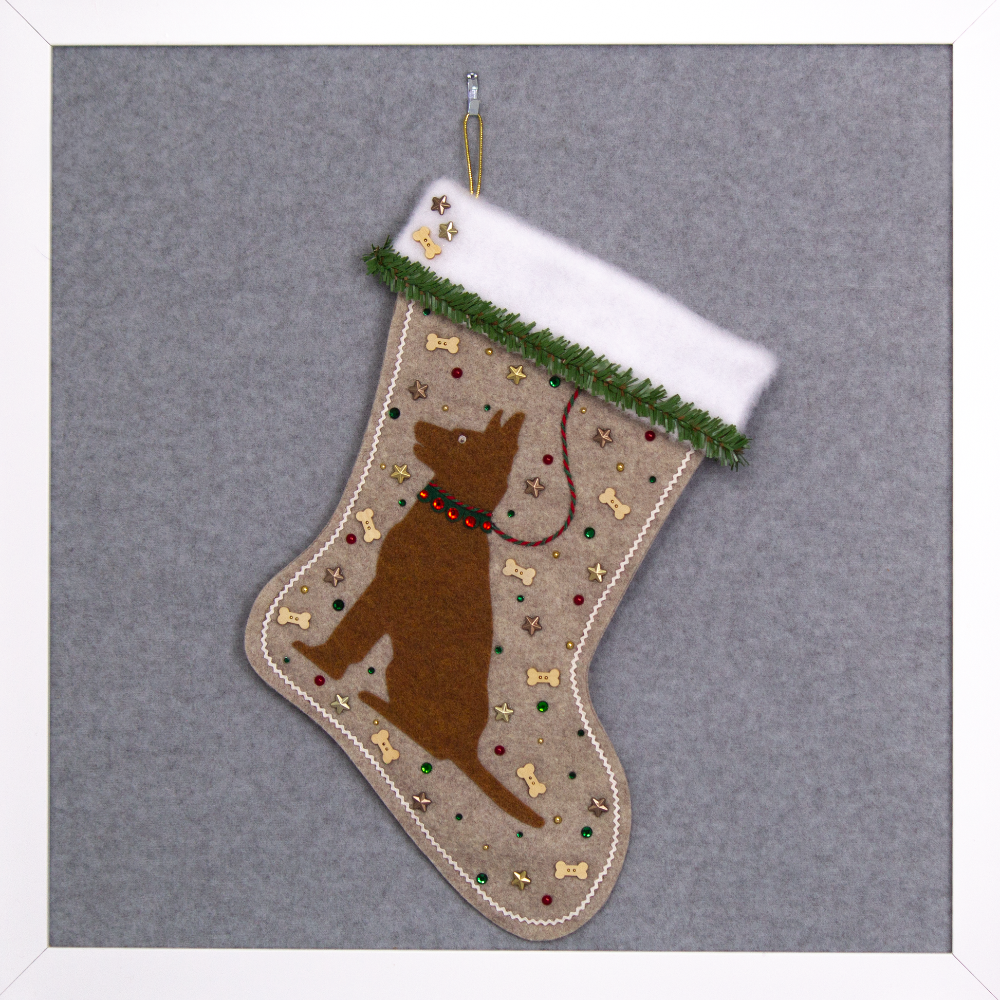 Copper German Shepherd dog on sandstone beige felt handmade Christmas stocking with faux pine trim, wood bone buttons, stars and decoration in red, green, white, gold and bronze. (front of stocking)