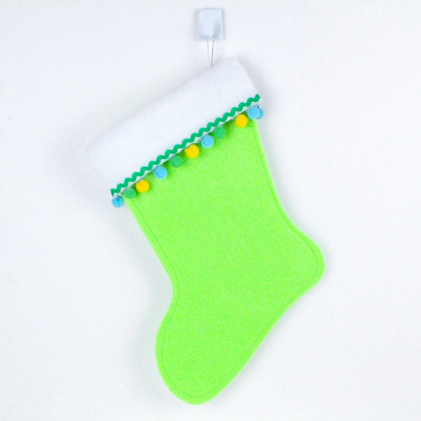 White octopus on green felt Christmas stocking