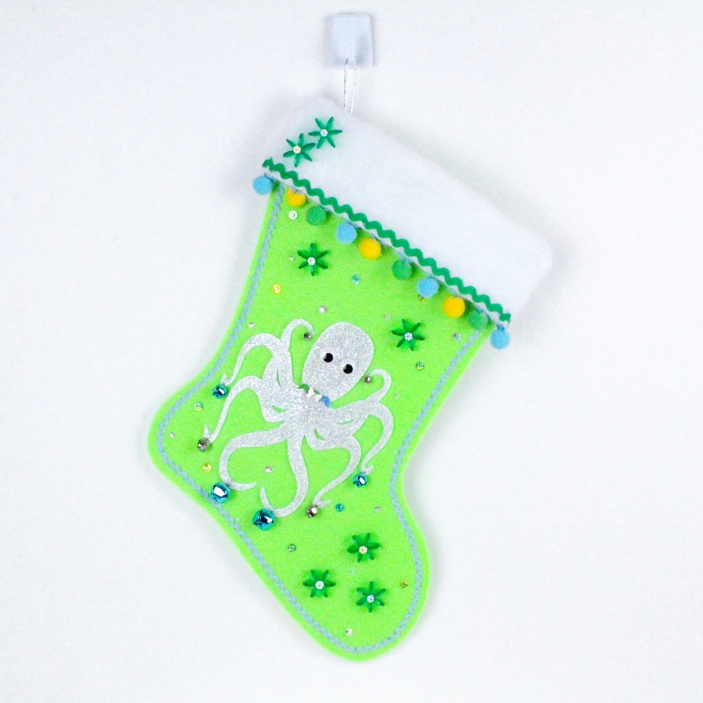 White octopus on green felt Christmas stocking