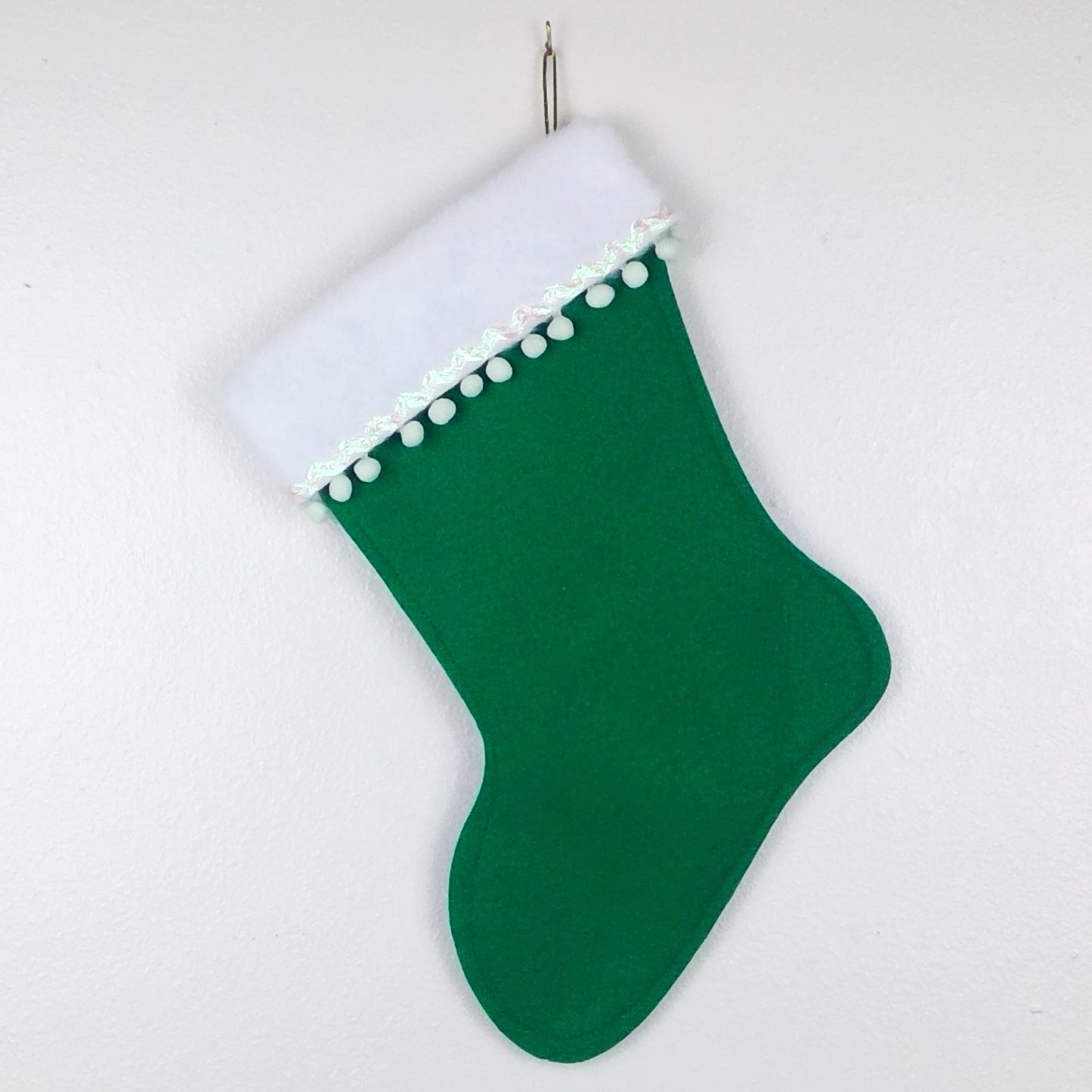 Mint octopus on green felt Christmas stocking