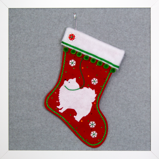 White Pomeranian dog on red felt OOAK handmade Christmas stocking with decorations in white, red, green and silver.