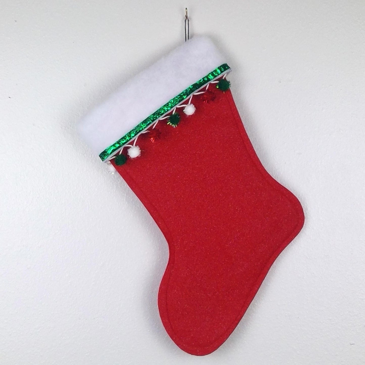 Off-white retro deer on red felt Christmas stocking