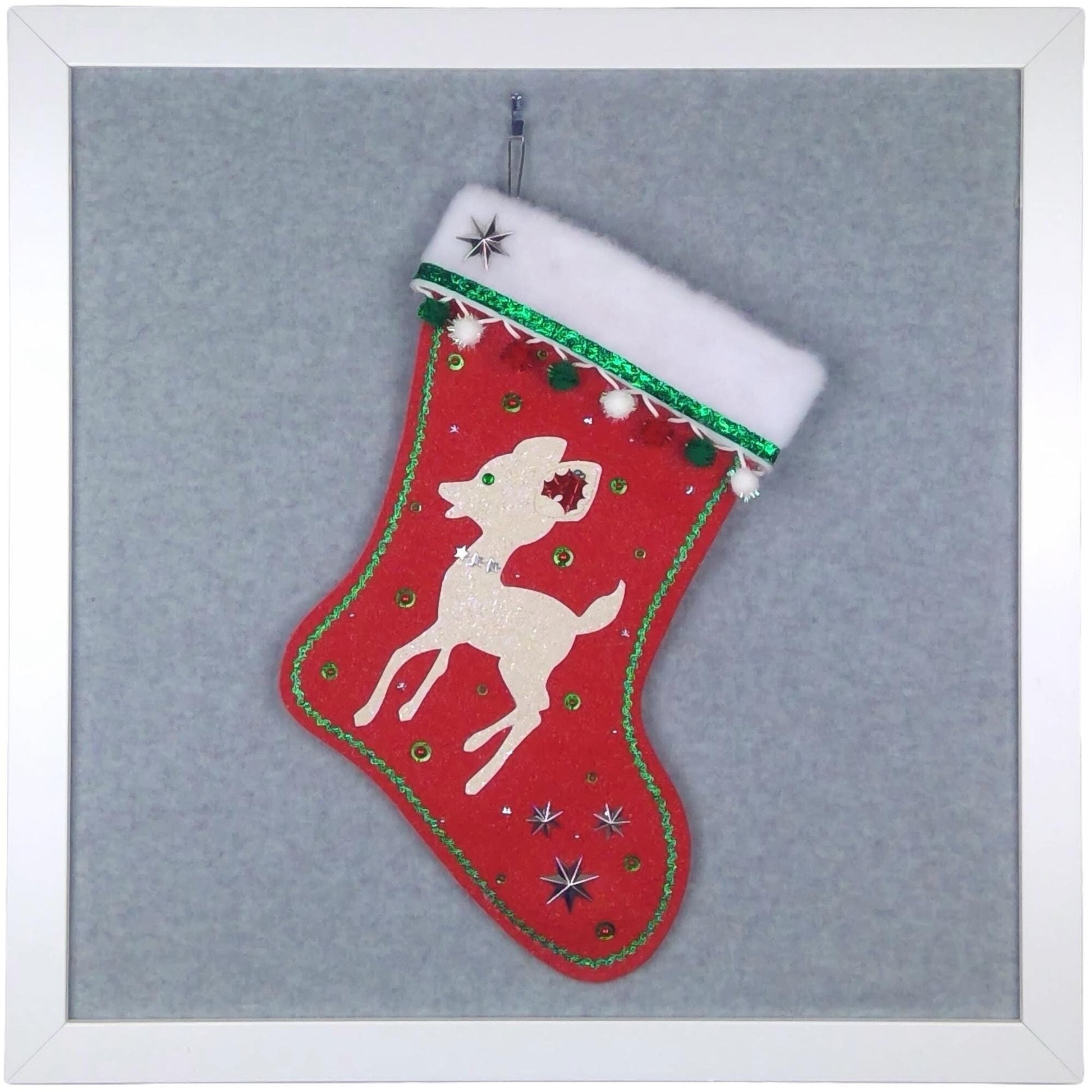 Glitter off-white retro deer on red felt handmade one of a kind Christmas stocking with silver stars, multicolor sparkly pom poms, and red / green / silver decorations.