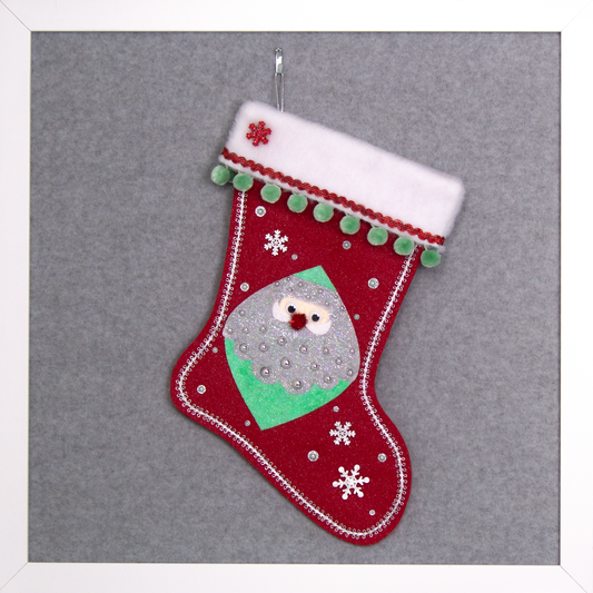 Marquise shaped Santa head (Holt Howard inspired) in silver and mint green glitter on a red glitter felt handmade Christmas stocking with wood snowflakes, pom poms and decorated in red, mint green & silver. (front of stocking)