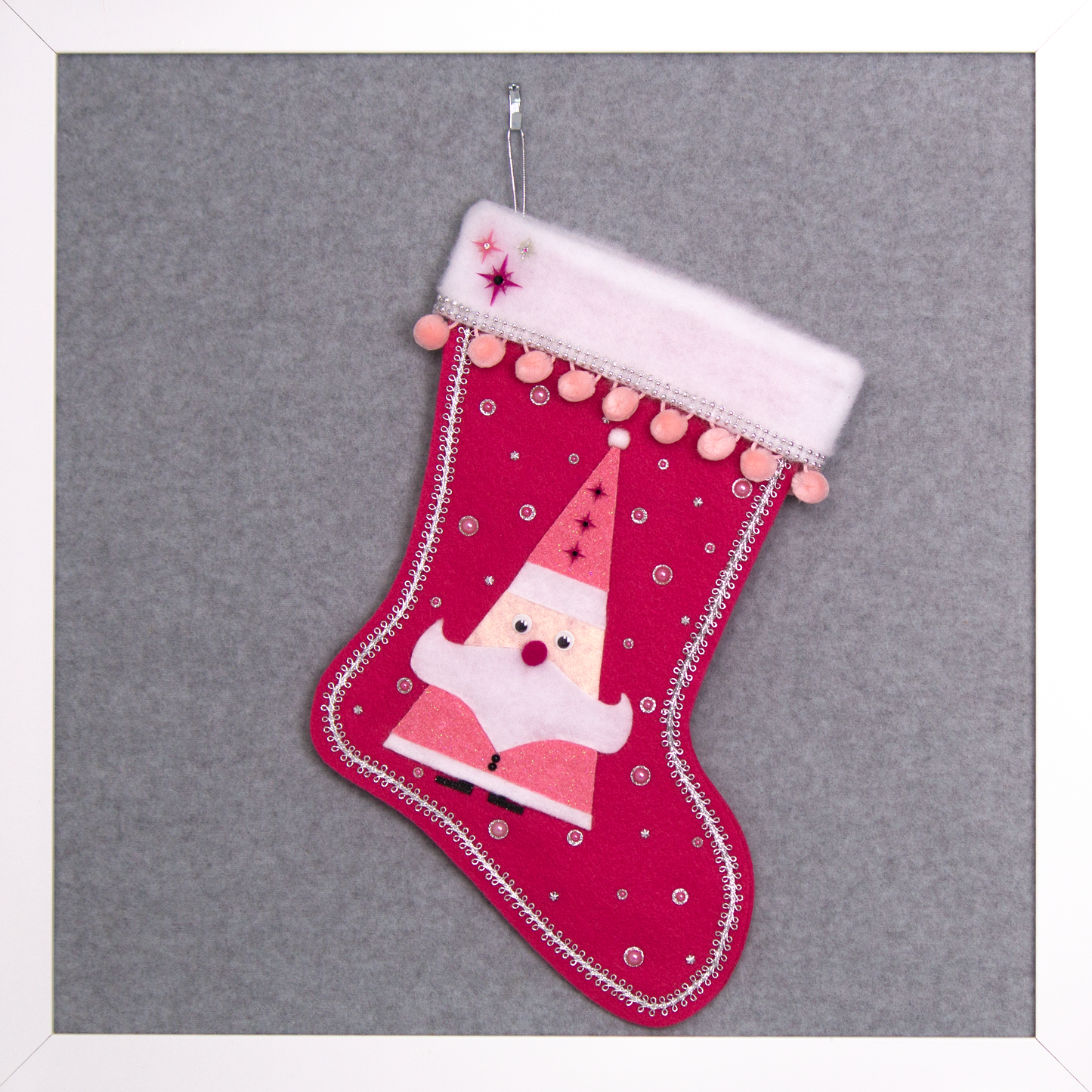 Triangular Santa (Holt Howard for Libbey inspired) in chunky pink glitter suit on bright pink felt handmade Christmas stocking with starbursts, pom poms and decoration in various pinks, black, white & silver. (front of stocking)