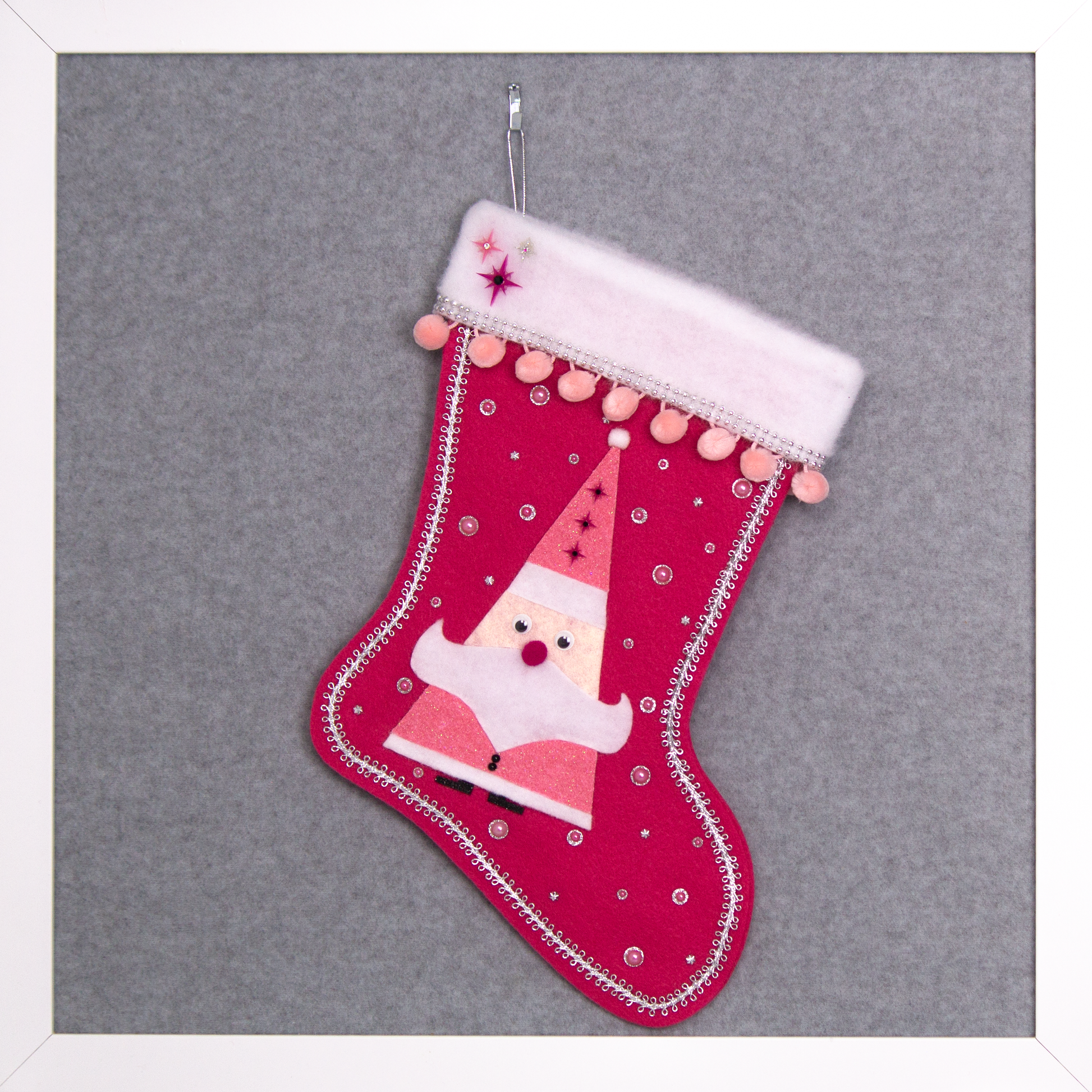 Triangular Santa (Holt Howard for Libbey inspired) in chunky pink glitter suit on bright pink felt handmade Christmas stocking with starbursts, pom poms and decoration in various pinks, black, white & silver. (front of stocking)