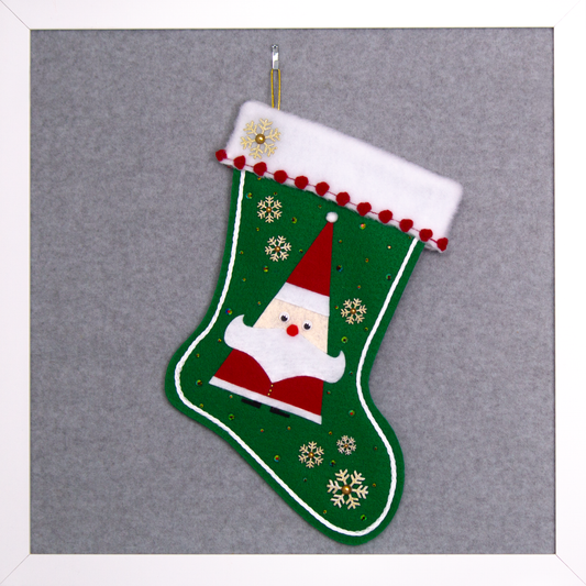 Triangular Santa (Holt Howard for Libbey inspired) in red suit on holiday green felt handmade Christmas stocking with glittered snowflake buttons, poms and decoration in white, red, holographic green & gold. (front of stocking)