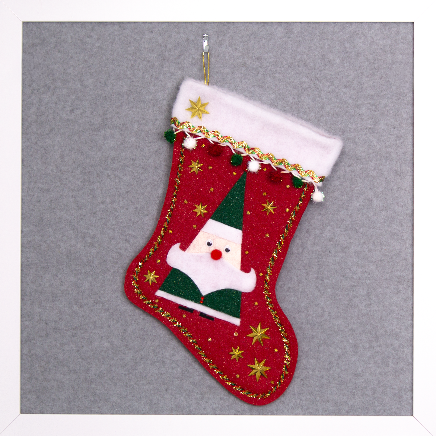 Triangular Santa (Holt Howard for Libbey inspired) in a glitter dark green suit on red glitter felt handmade Christmas stocking with star buttons, sparkly pom poms and decoration in red, green, white & gold. (front of stocking)