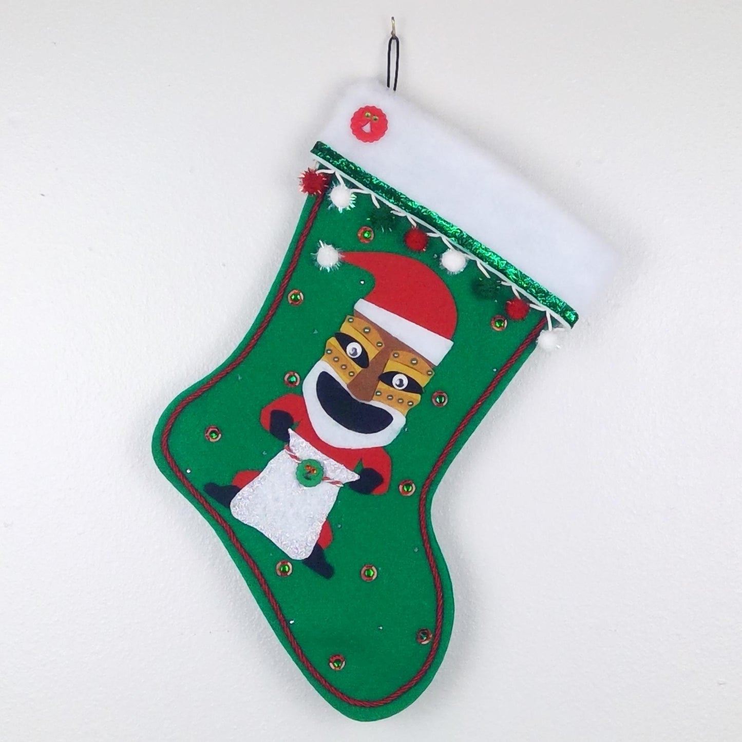 Tiki Santa on green felt Christmas stocking