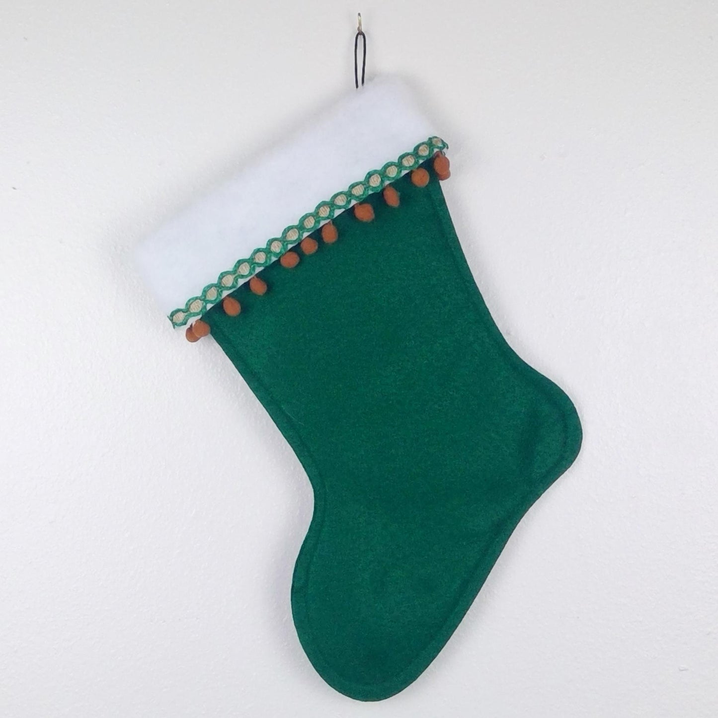 Tiki Santa on dark green felt Christmas stocking