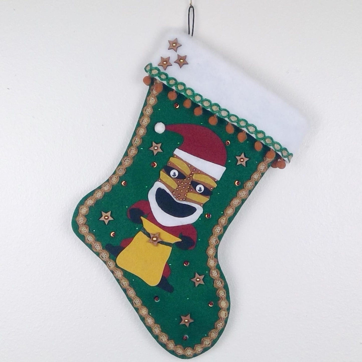 Tiki Santa on dark green felt Christmas stocking