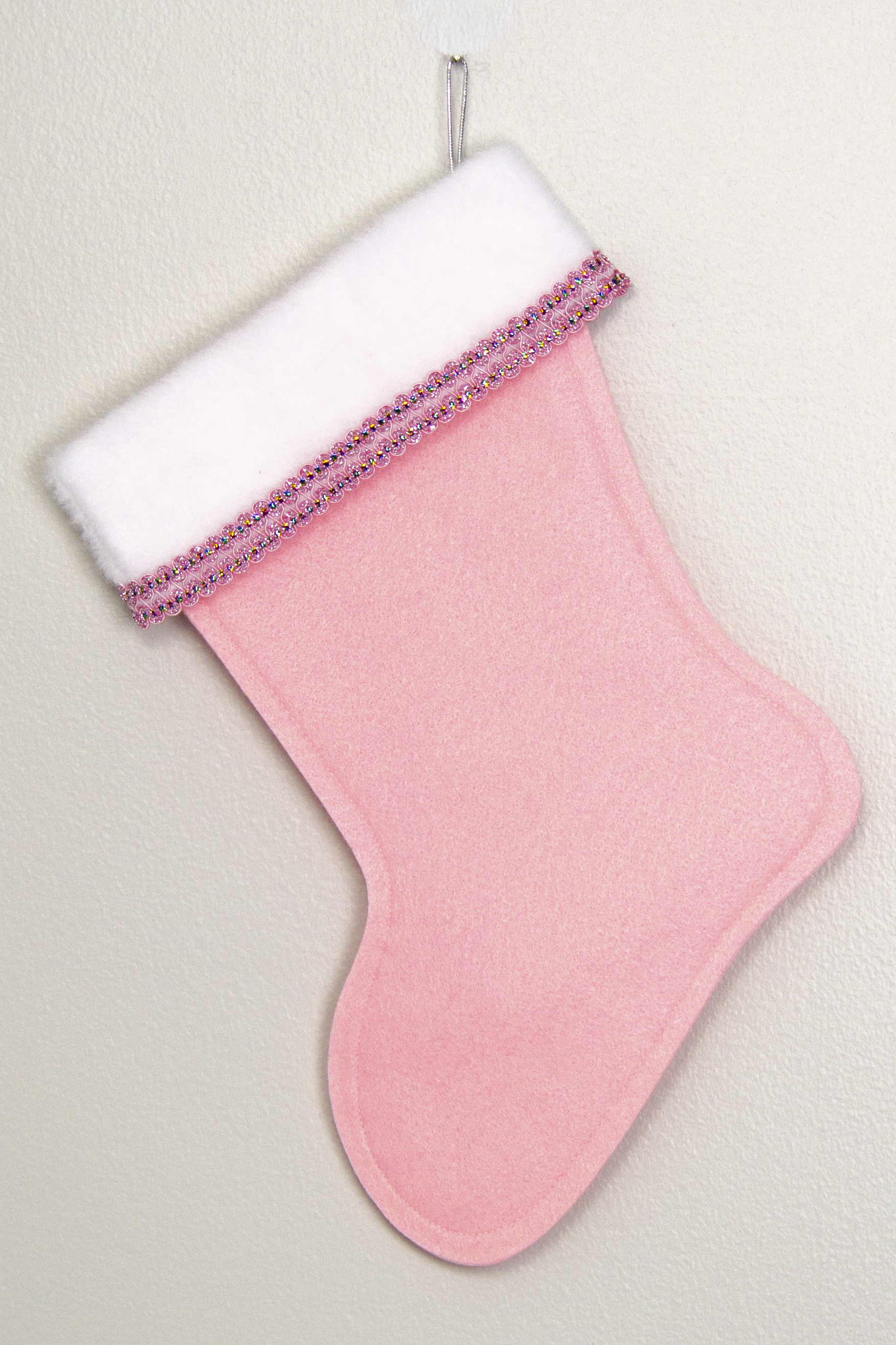 Light pink felt handmade Christmas stocking with decoration in light pink, silver & multicolors. (back of Tree stocking)