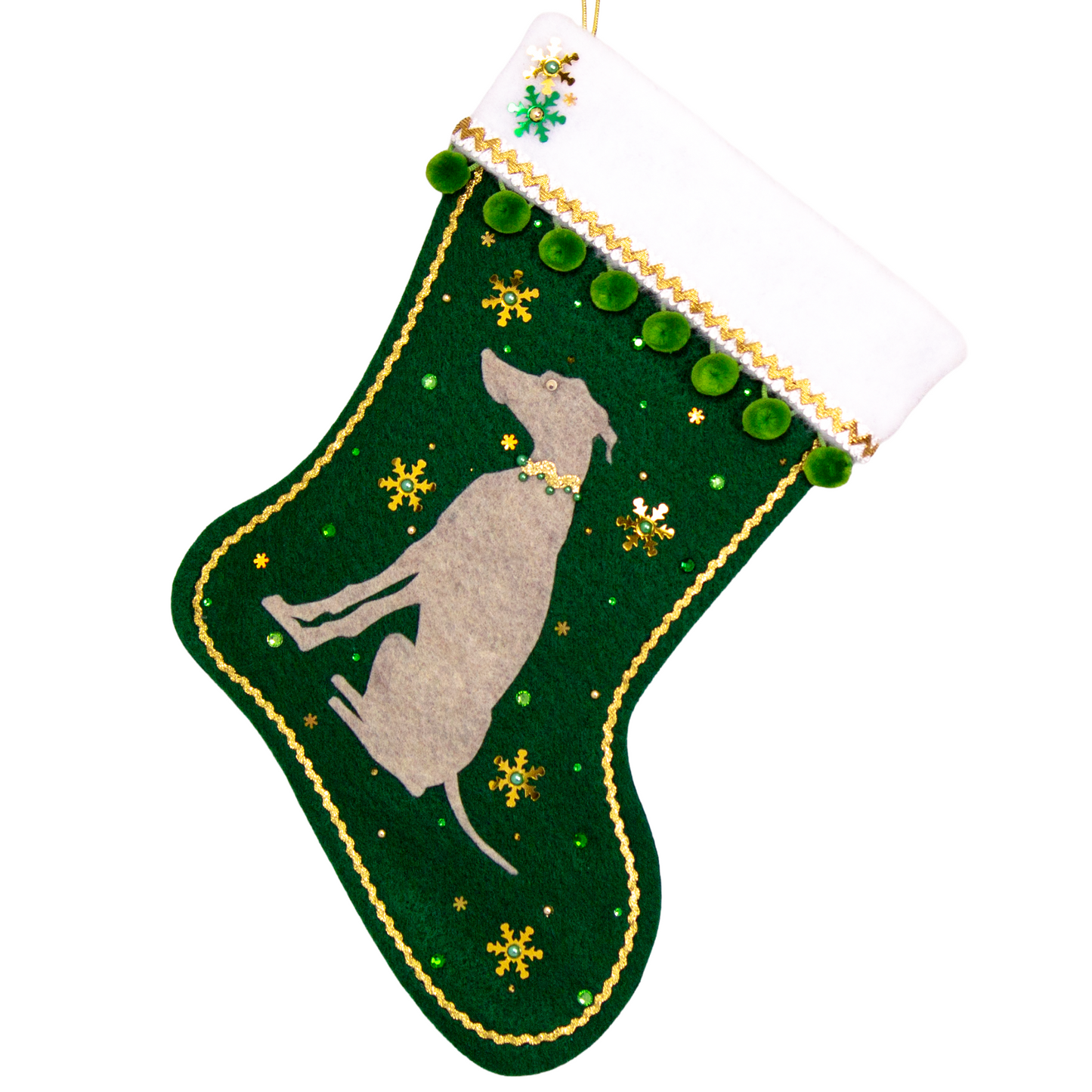 Sandstone beige Whippet dog on dark green felt handmade Christmas stocking with snowflake sequins, pom poms and decorated in gold and green. (front of stocking)