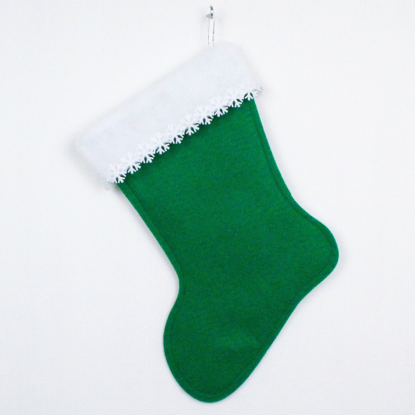 White cat on green felt Christmas stocking