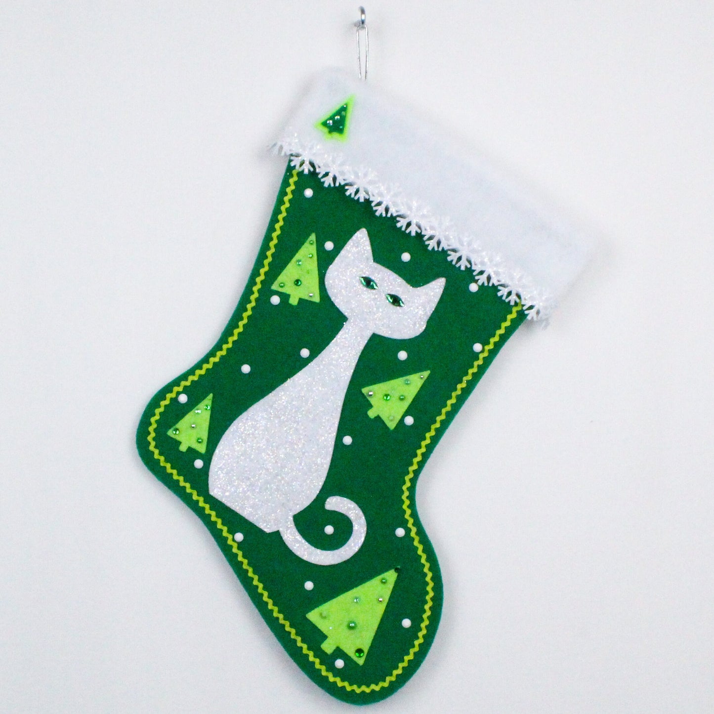 White cat on green felt Christmas stocking