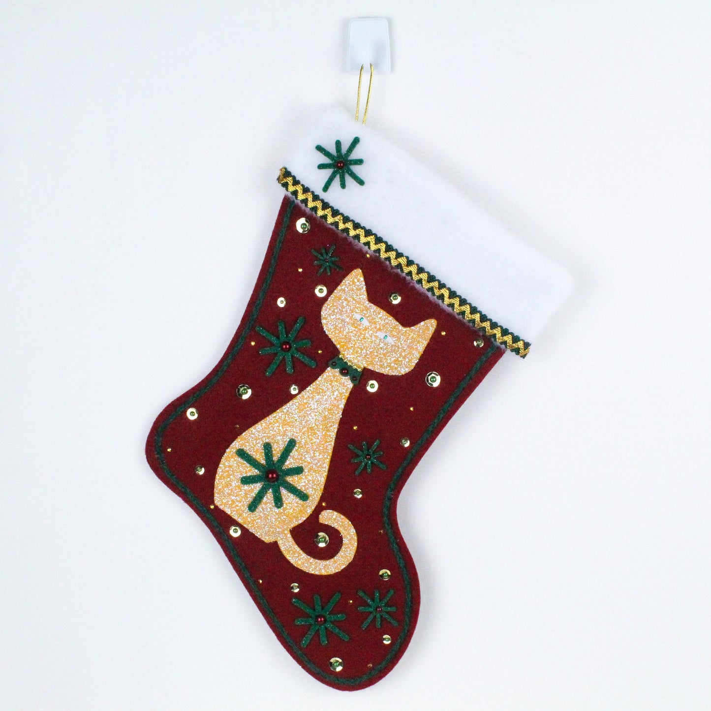 Gold cat on dark red felt Christmas stocking