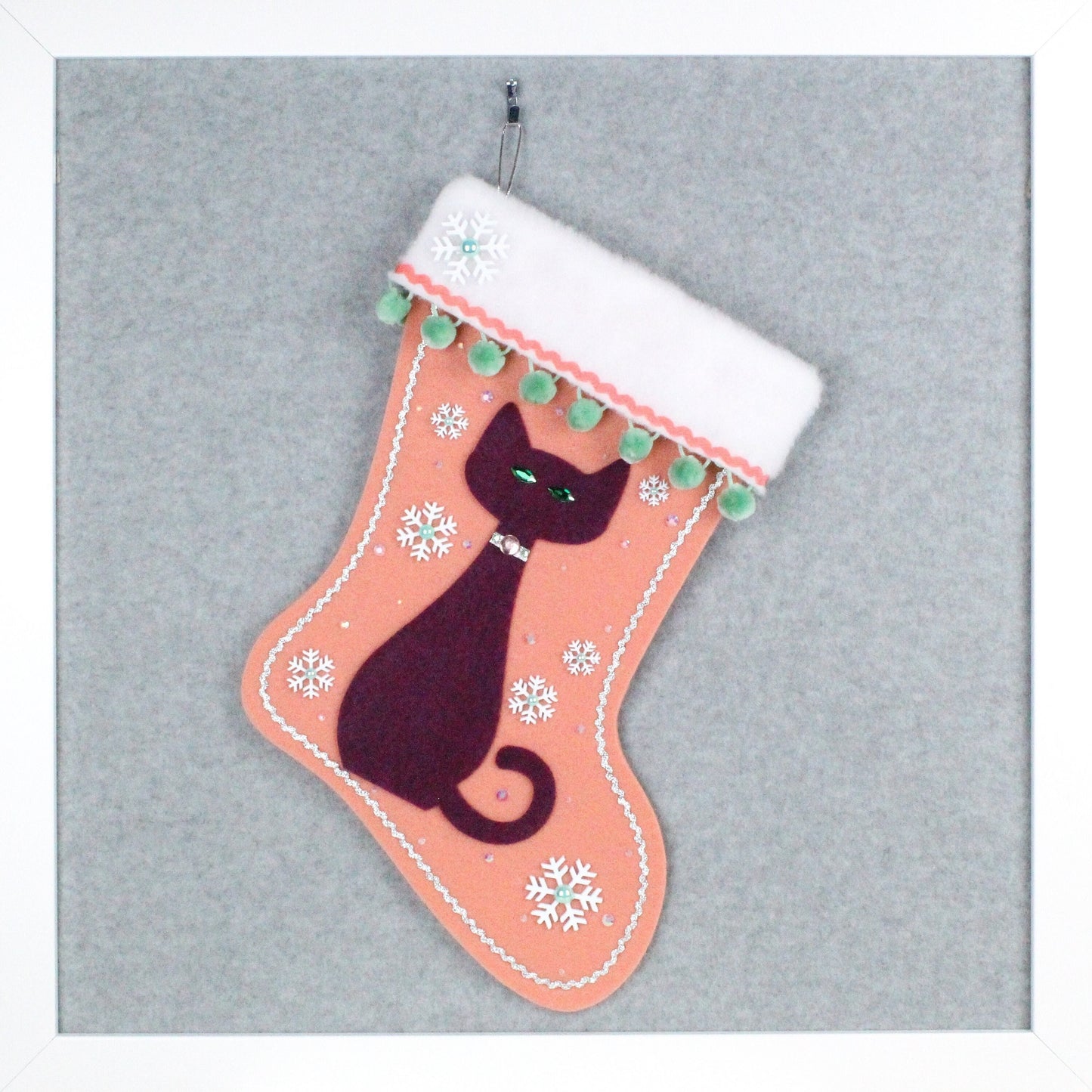 Purple cat on coral felt handmade OOAK Christmas stocking with mint green pom poms, white snowflakes and silver decoration.