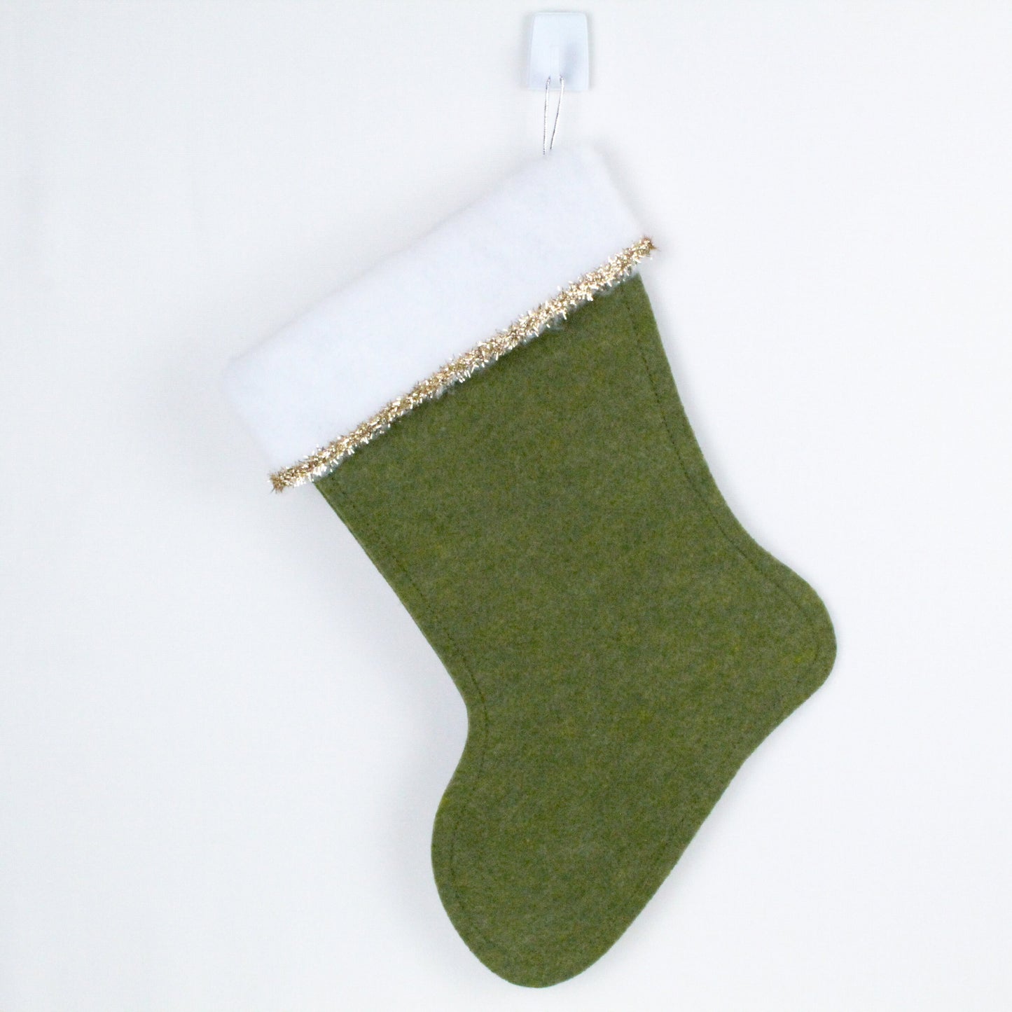 Red cat on green felt Christmas stocking