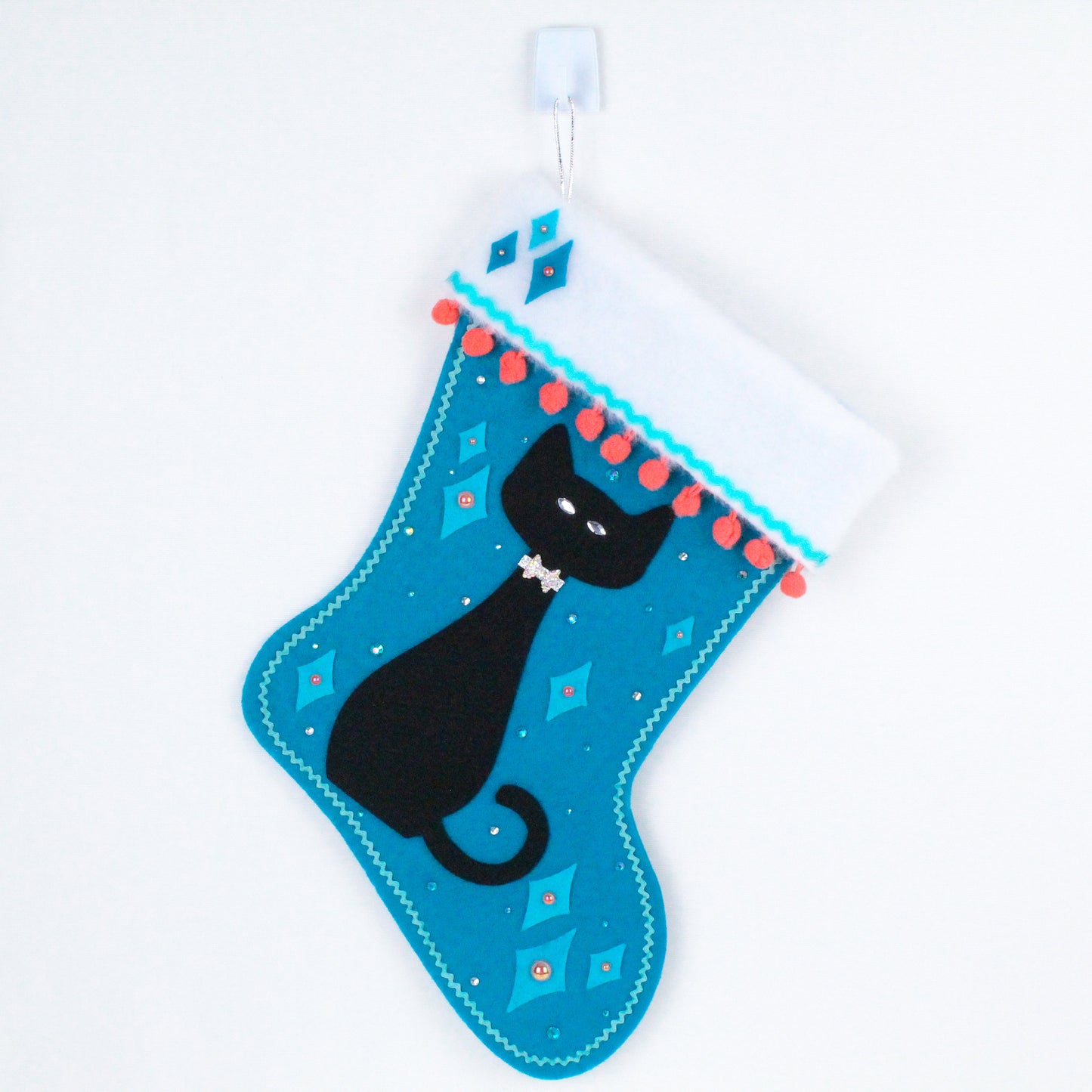 Black cat on turquoise felt Christmas stocking