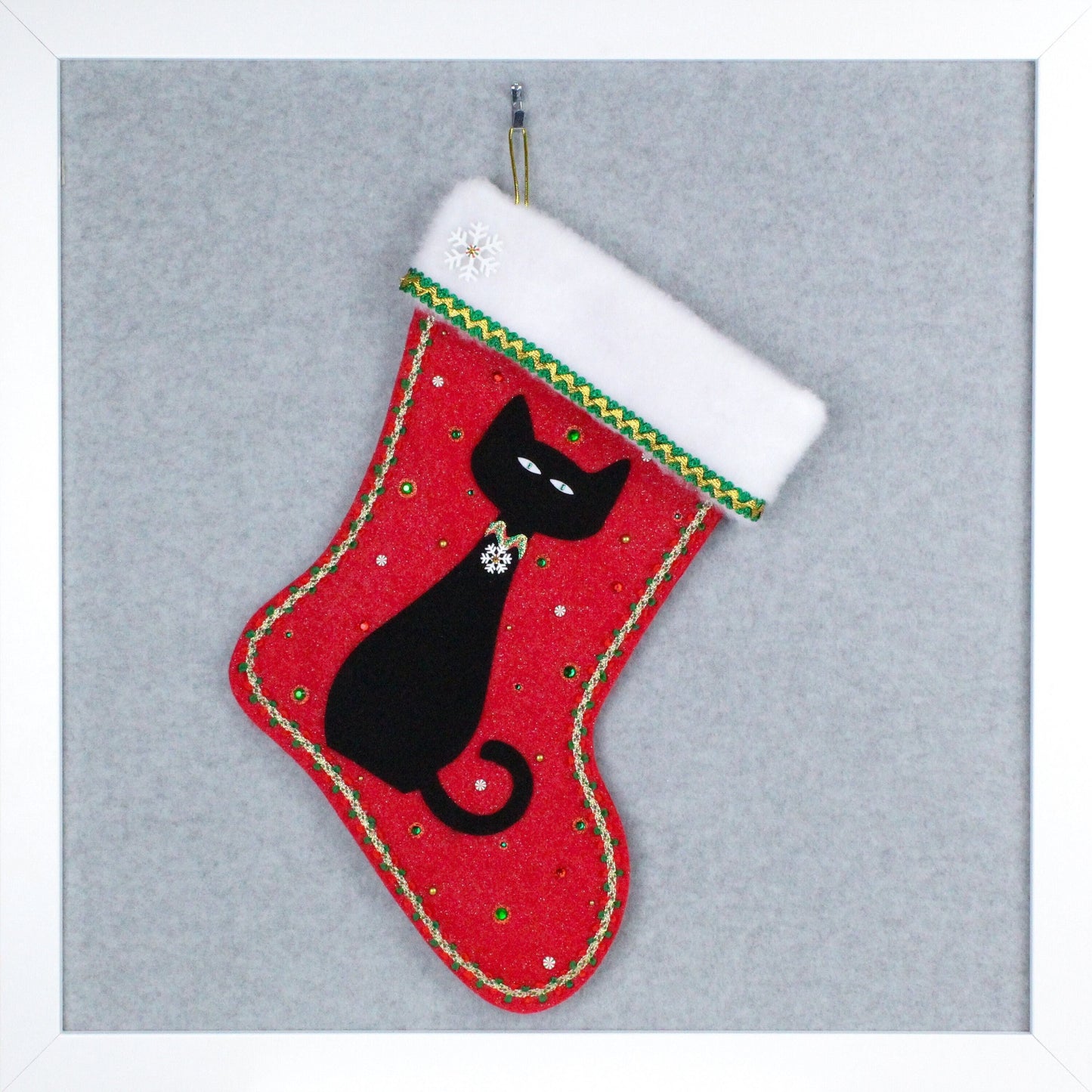 Black cat on glitter red felt handmade OOAK Christmas stocking with gold and green decorations.