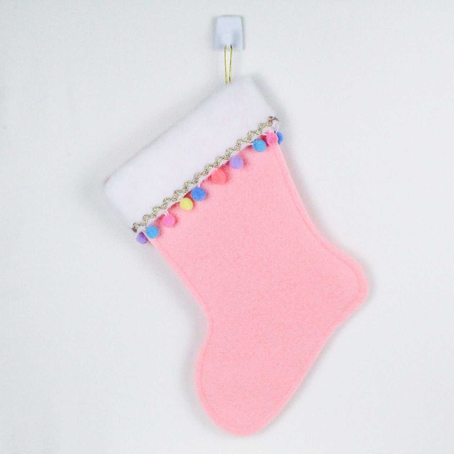 White cat on pink felt Christmas stocking