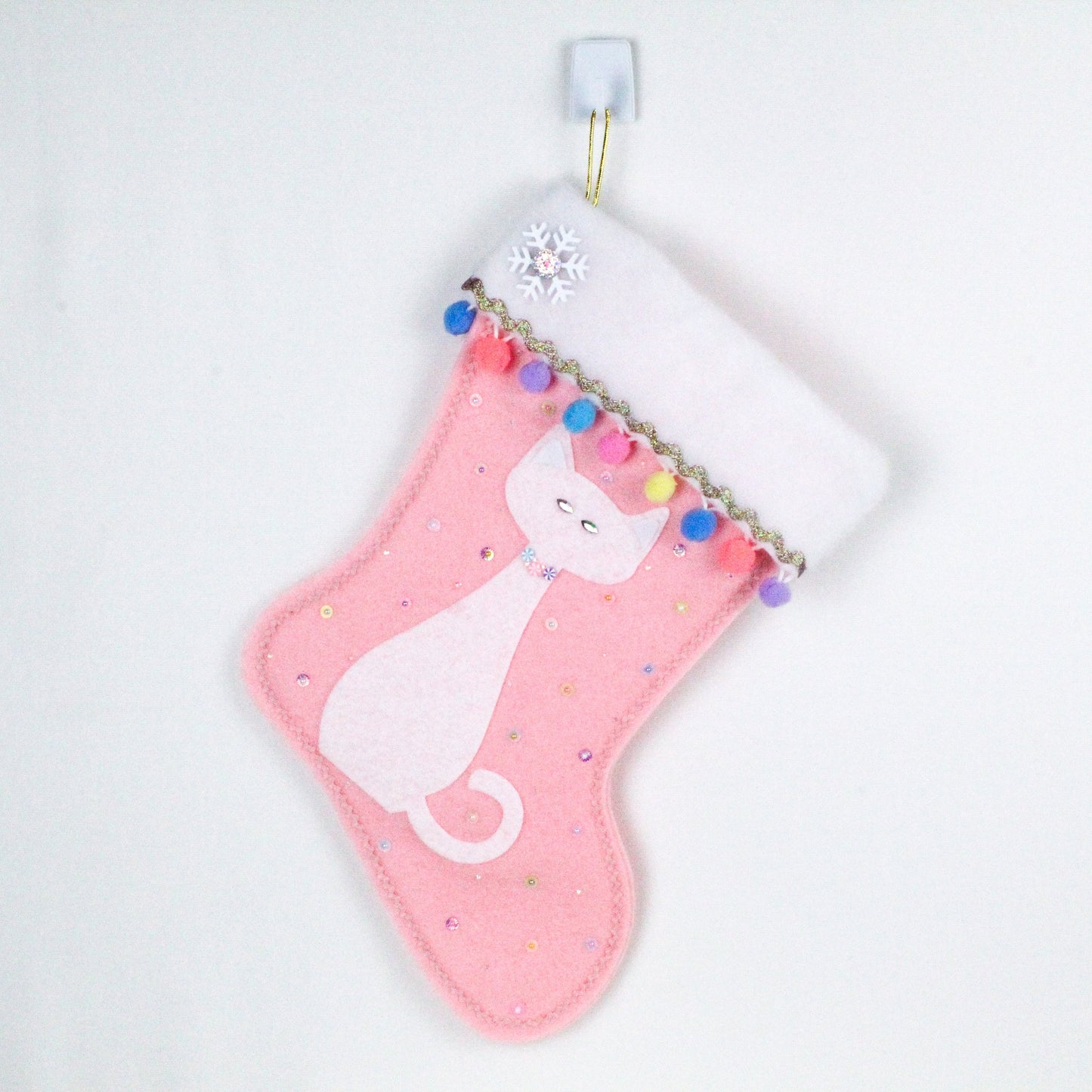White cat on pink felt Christmas stocking