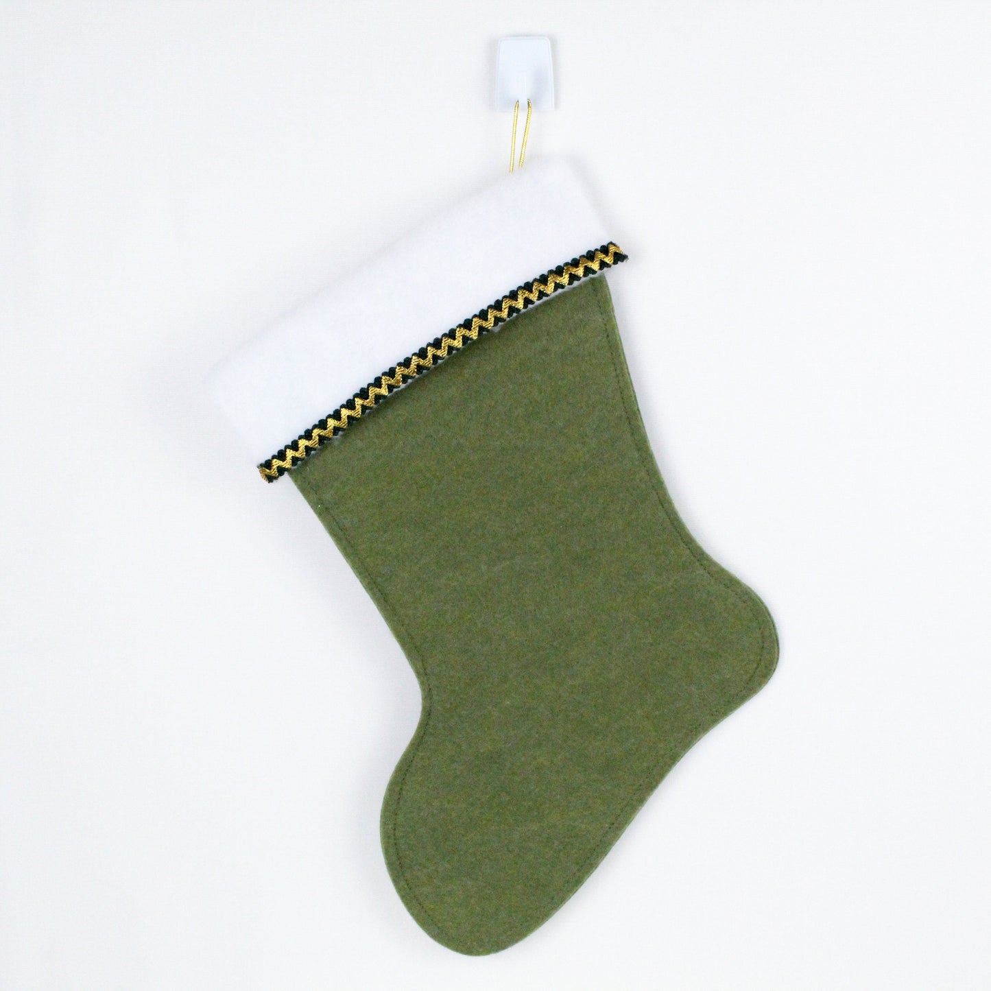White cat on green felt Christmas stocking