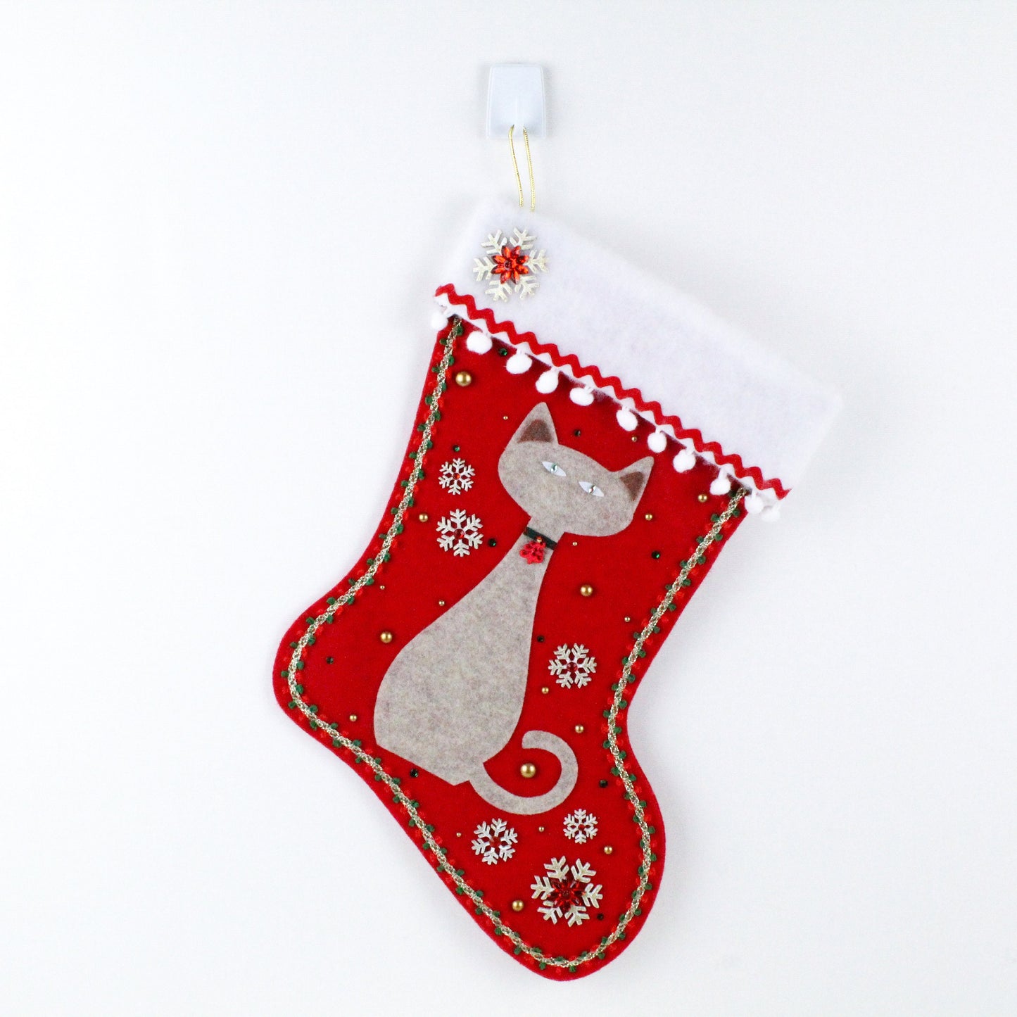 Beige cat on red felt Christmas stocking